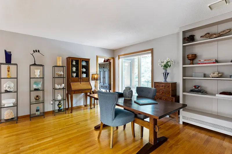 Versatile home office, library, or cozy sitting room conveniently located off the main entrance