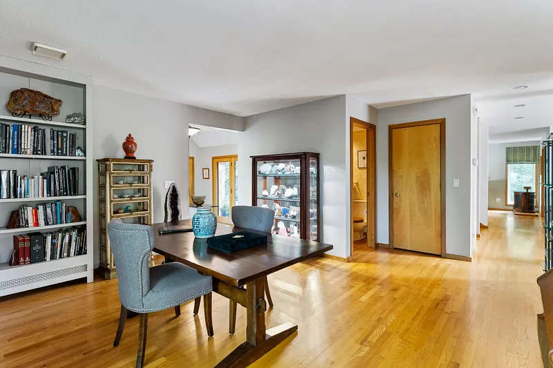 Built-in bookshelves add character and functionality to this versatile room