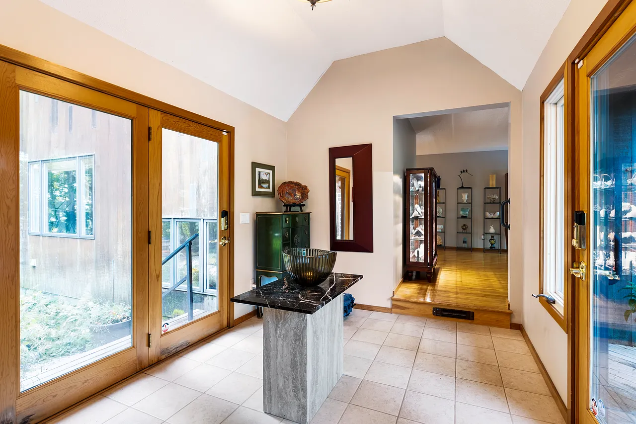 Light-filled foyer invites you to seamlessly flow into the home